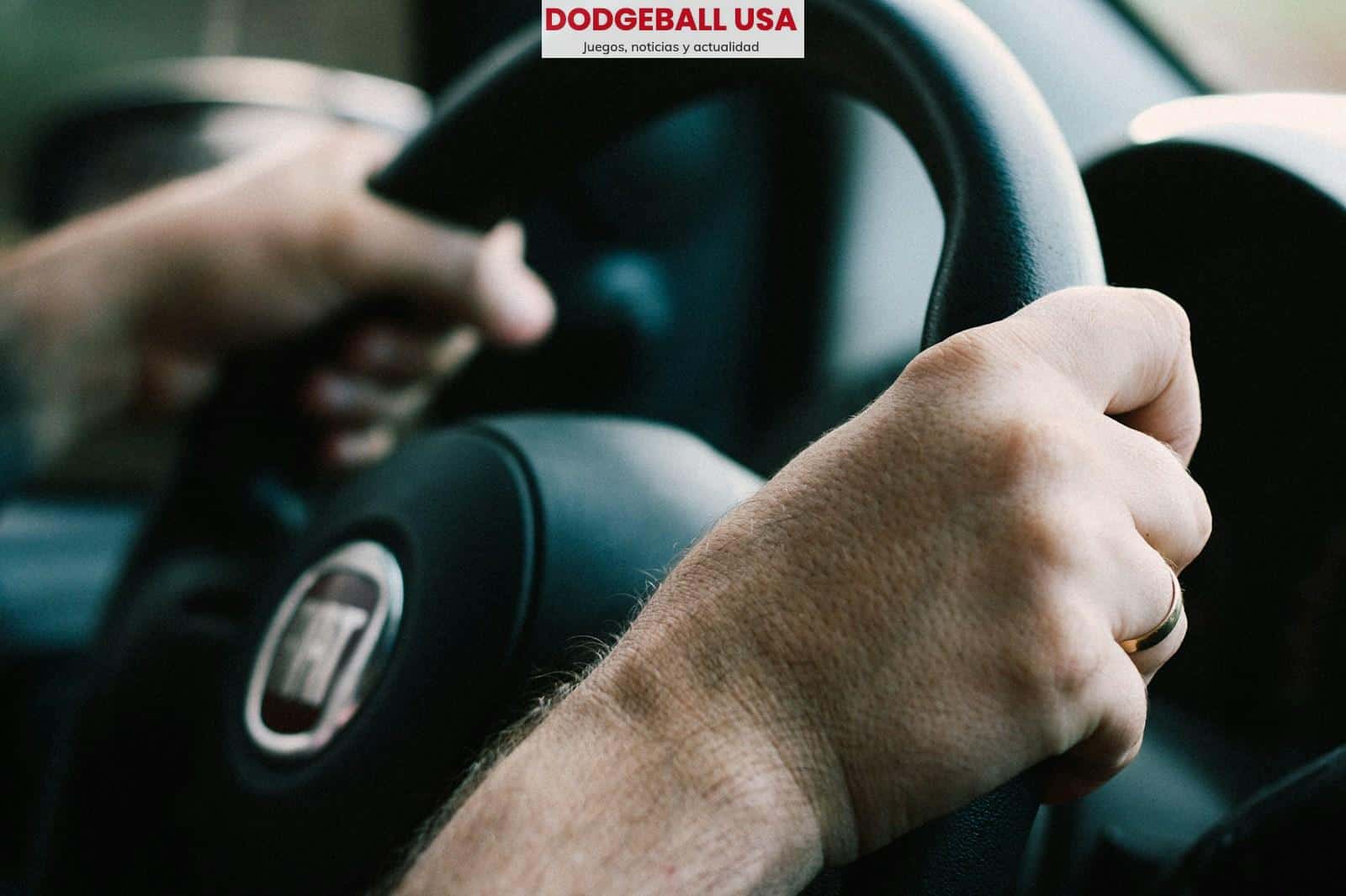 man driving Fiat car
