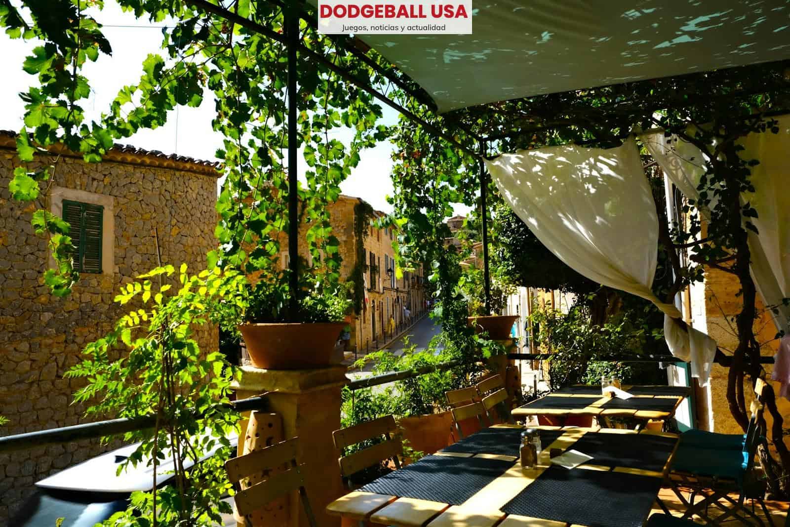 a patio with tables and chairs